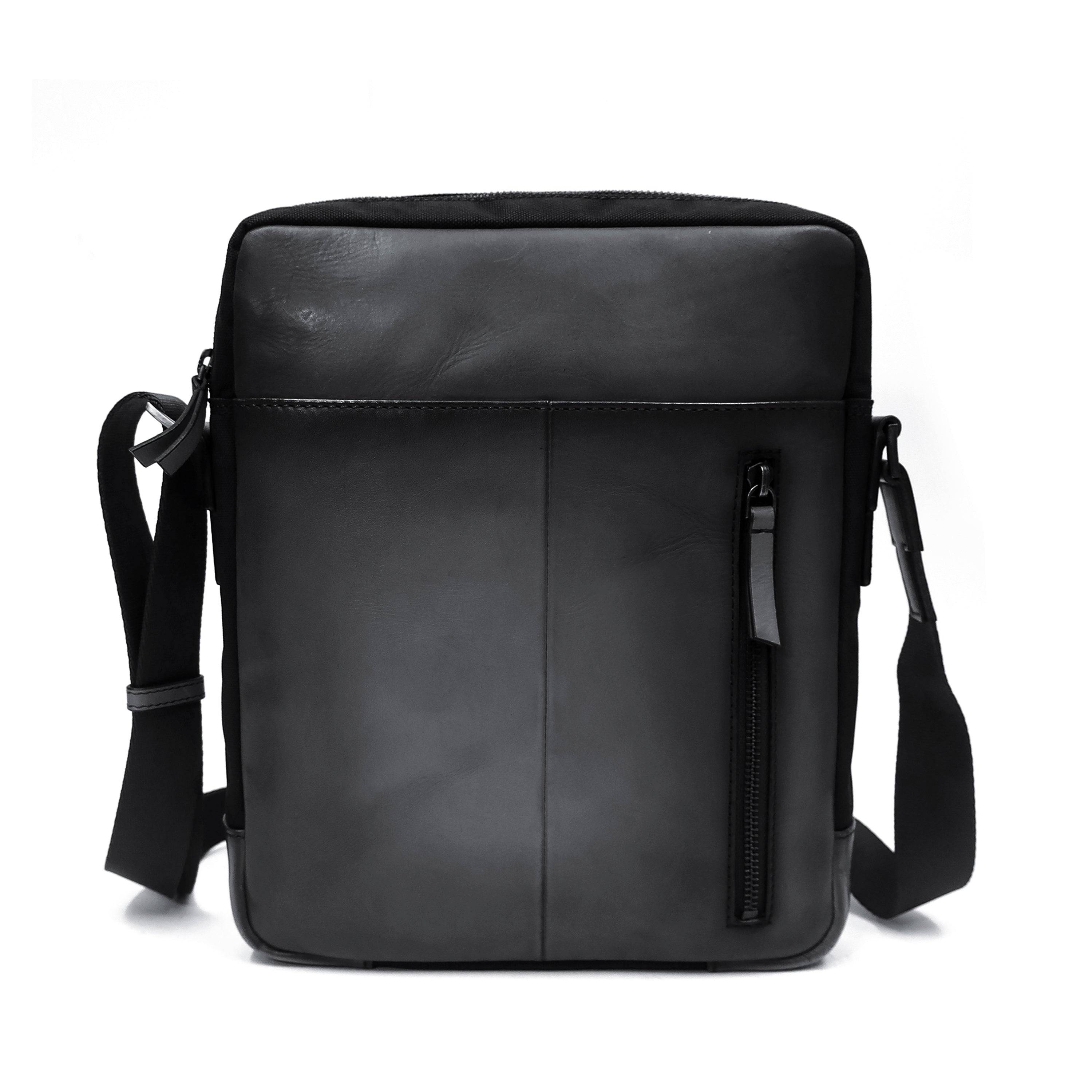 a black leather messenger bag with a shoulder strap