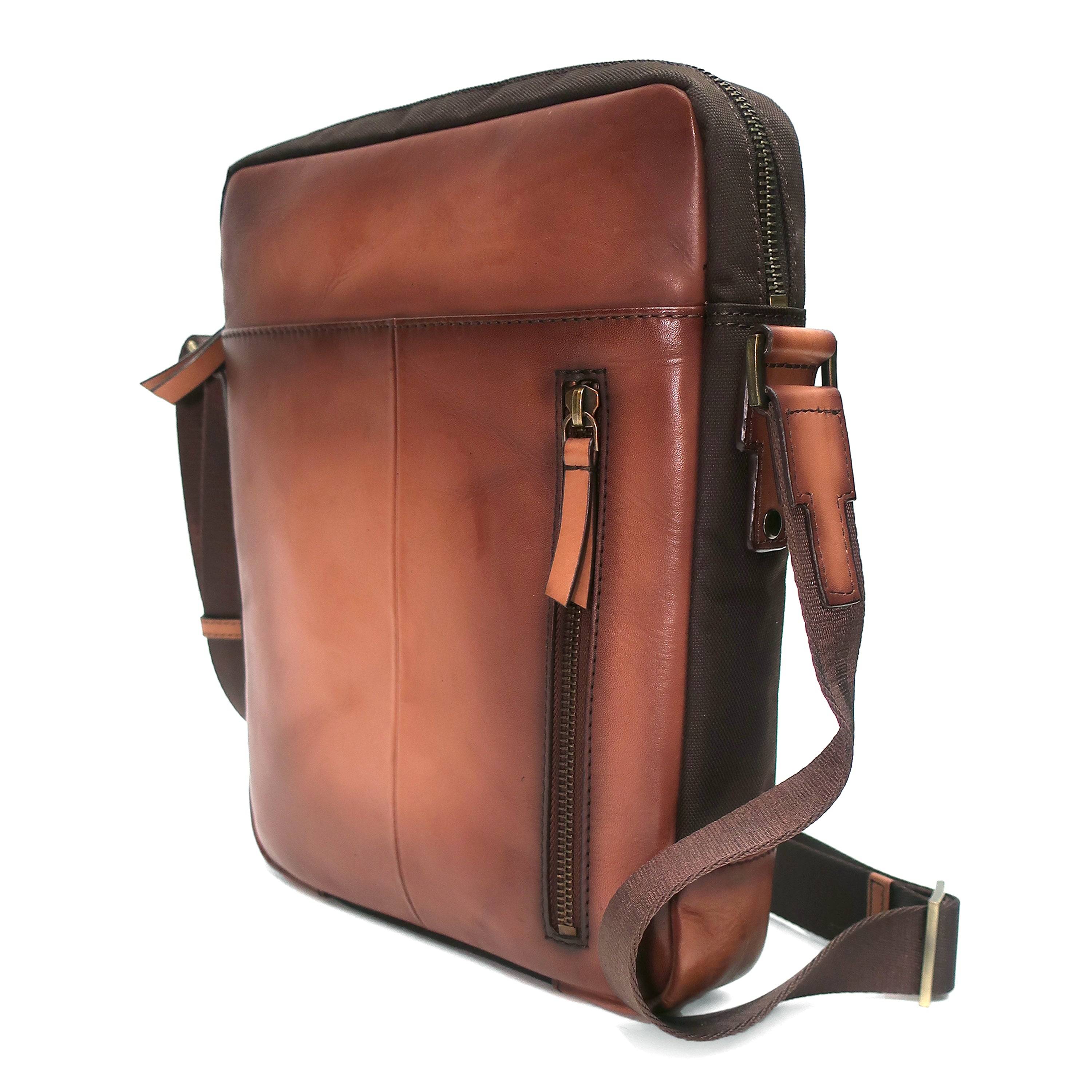 a brown leather messenger bag on a shoulder strap