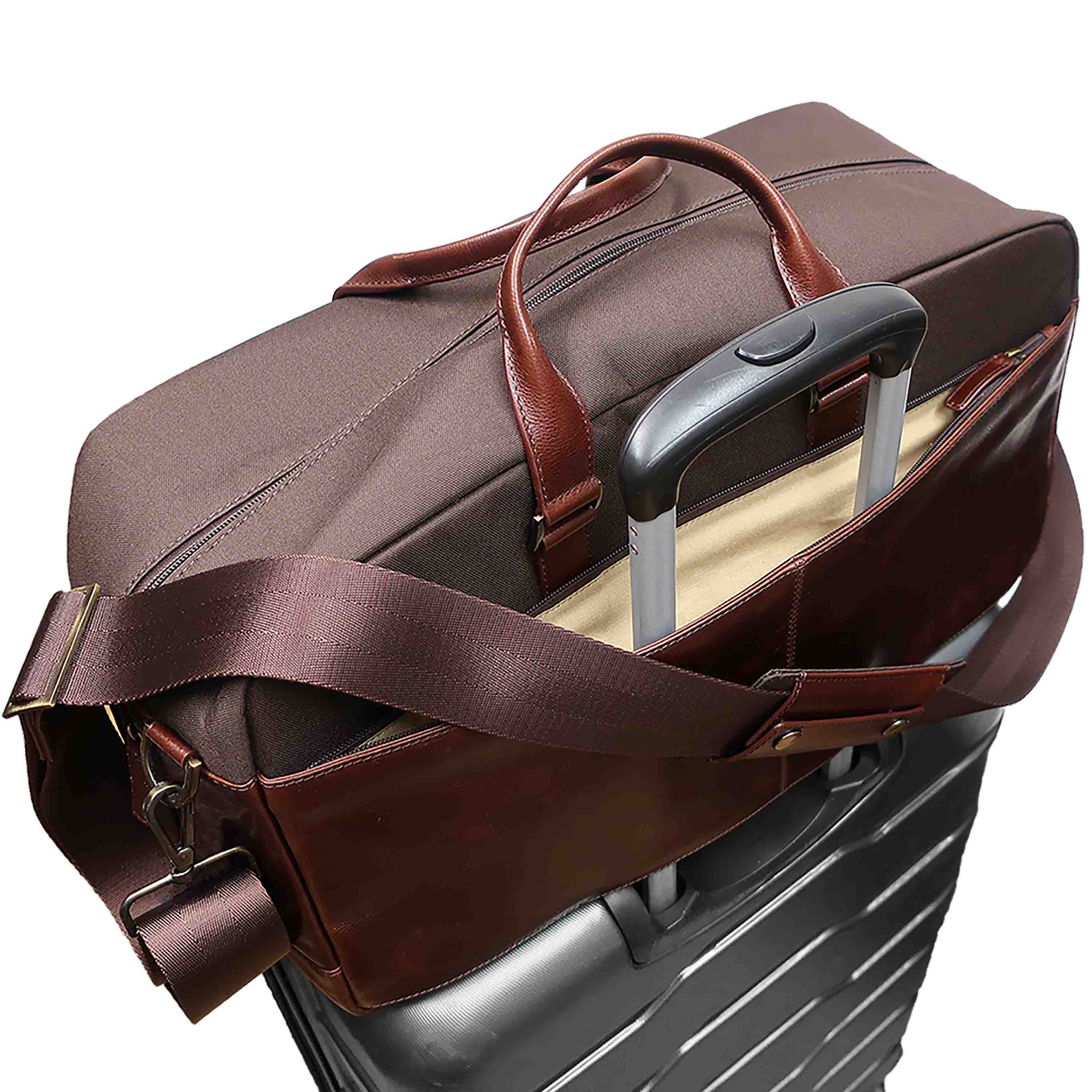 a piece of luggage with a leather handle