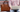 briefcase next to a person sitting on a bench