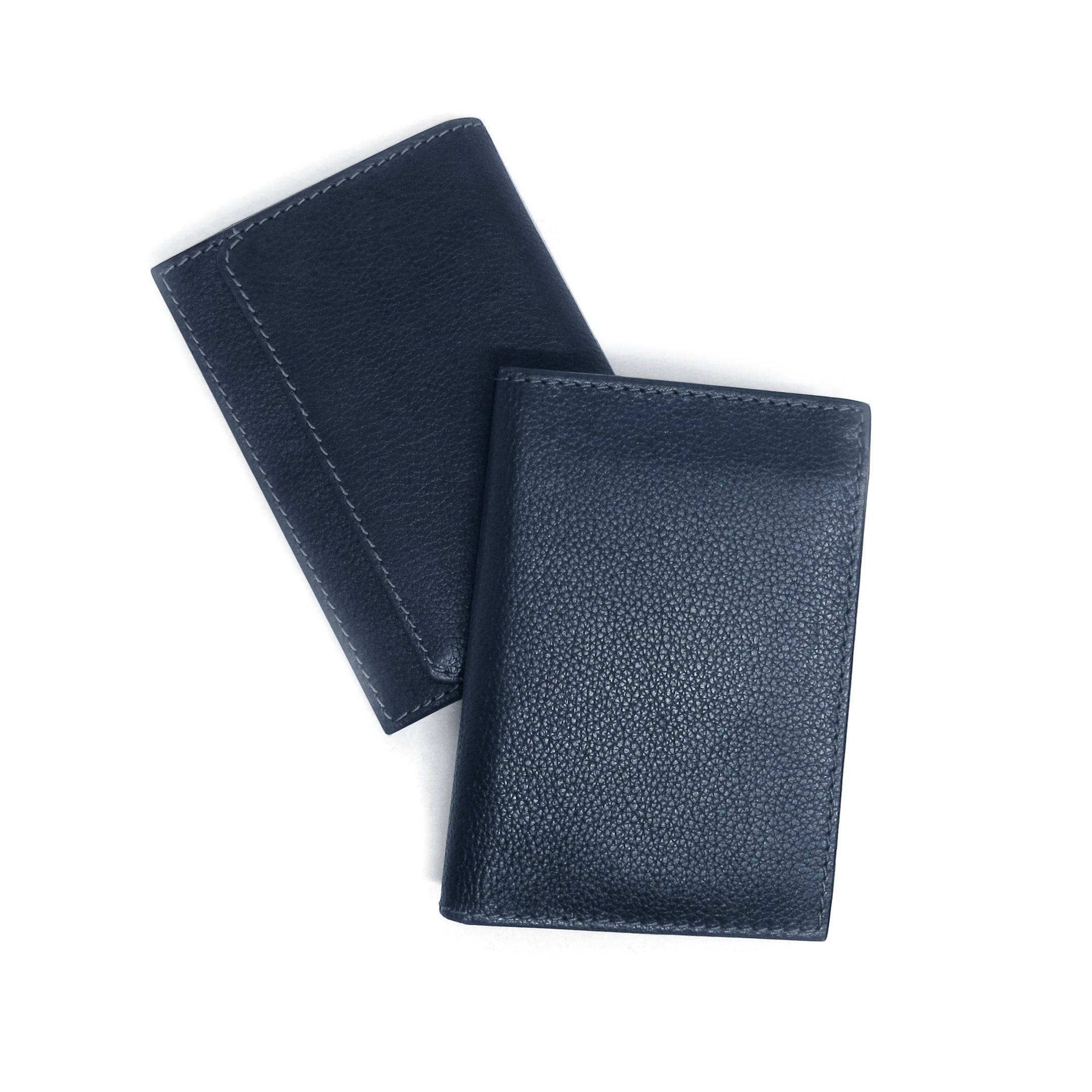 blue leather wallets on a white background