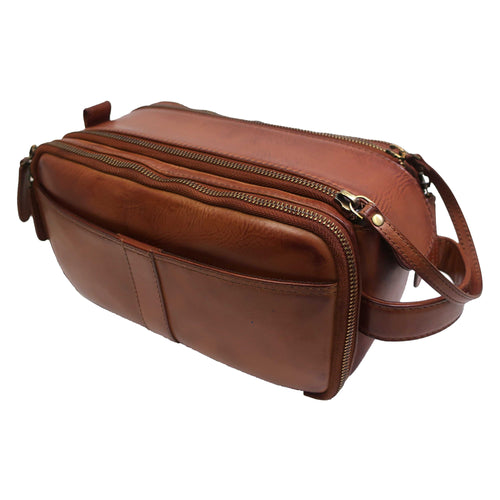 Darius Leather Travel Kit - Double Zip in cognac brown full grain leather with dual compartments and side handle for compact, durable storage.