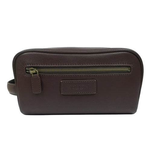A dark brown full grain leather travel kit with a horizontal zippered pocket and a small embossed BOCONI logo plate on the front with antique brass zipper