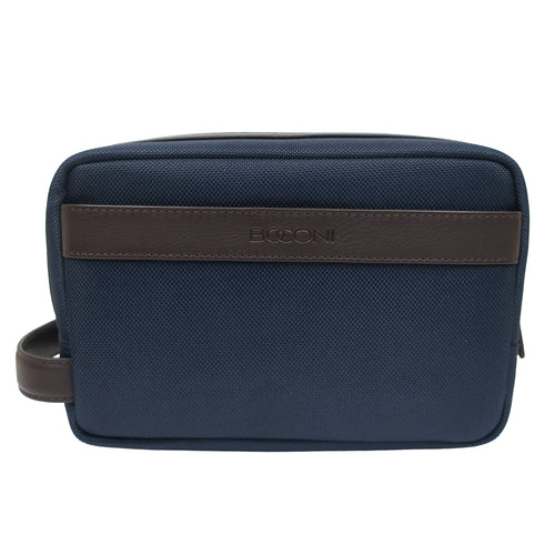 A front view of a navy blue ballistic nylon toiletry bag with a brown full grain leather strap across the front featuring the embossed brand name BOCONI