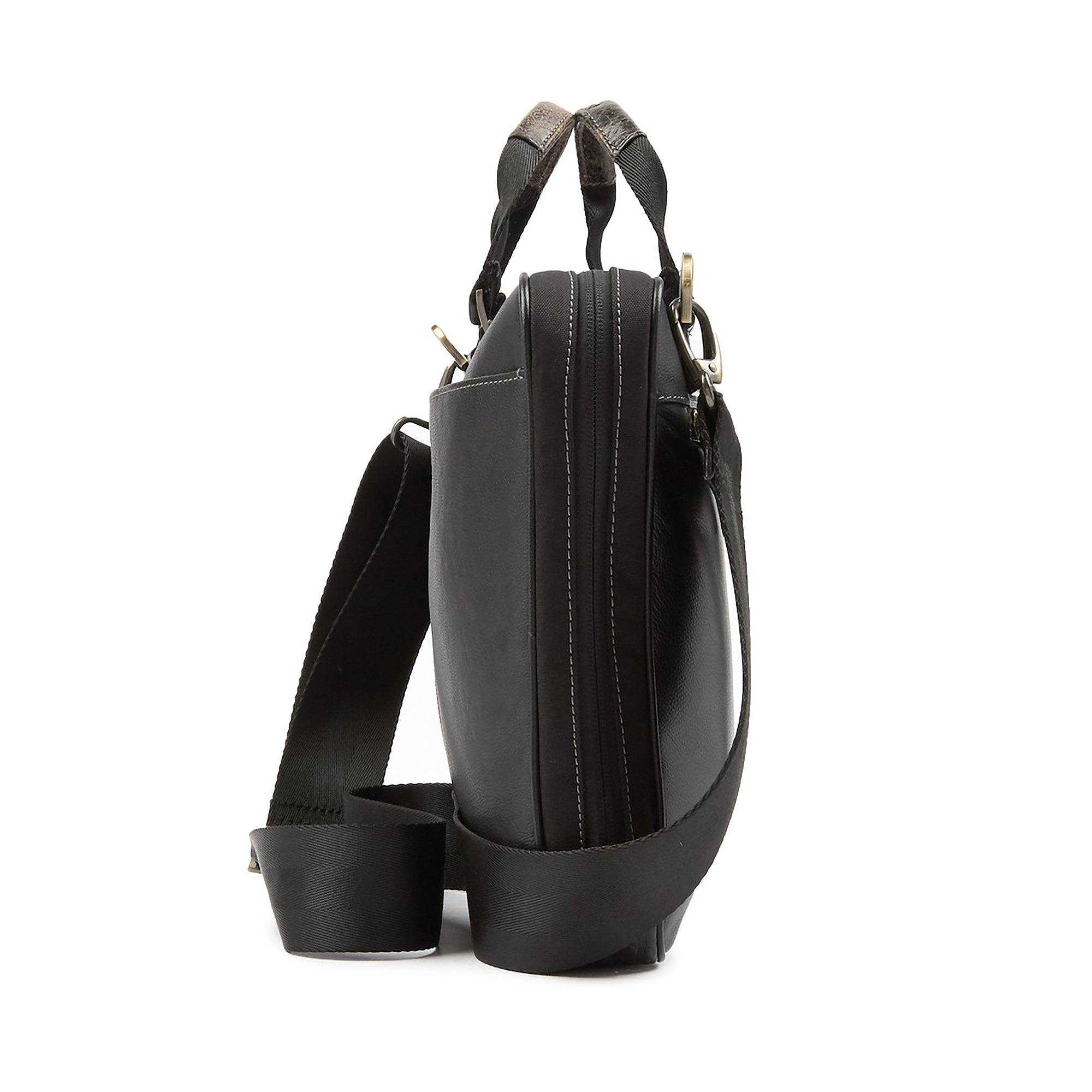 a black handbag on a white background
